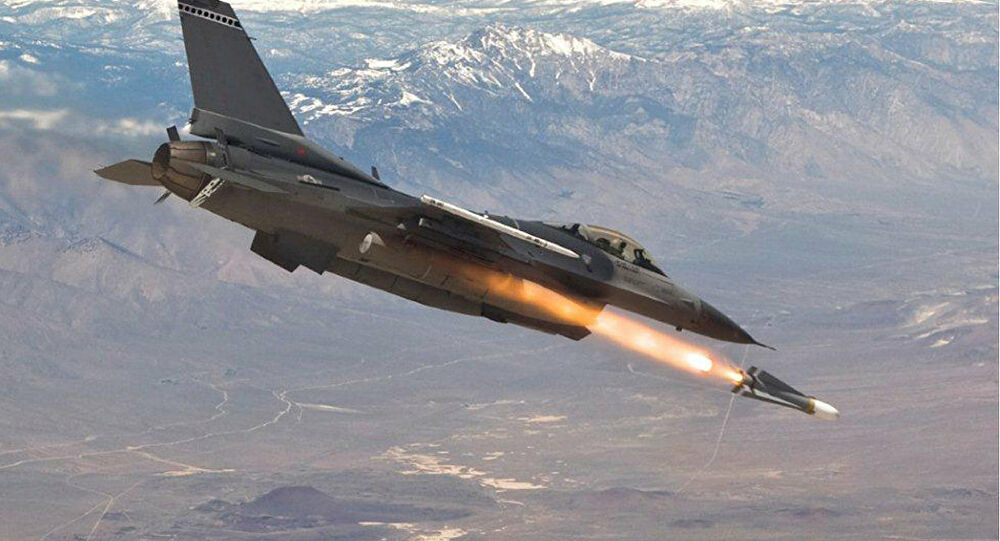 Image of F-16 firing munition